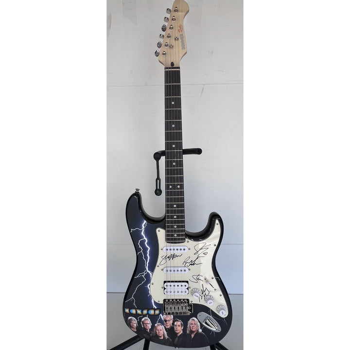 Steve Walsh, Robby Steinhardt, Dave Hope, Kerry Livgren, Rich Williams, Phil Ehart Kansas band signed electric guitar with proof.