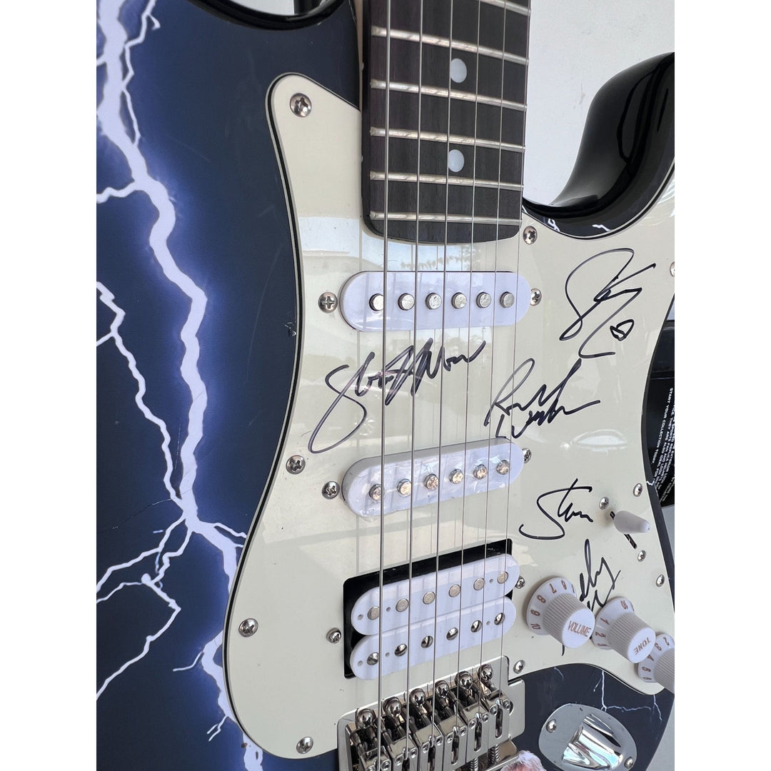 Steve Walsh, Robby Steinhardt, Dave Hope, Kerry Livgren, Rich Williams, Phil Ehart Kansas band signed electric guitar with proof.
