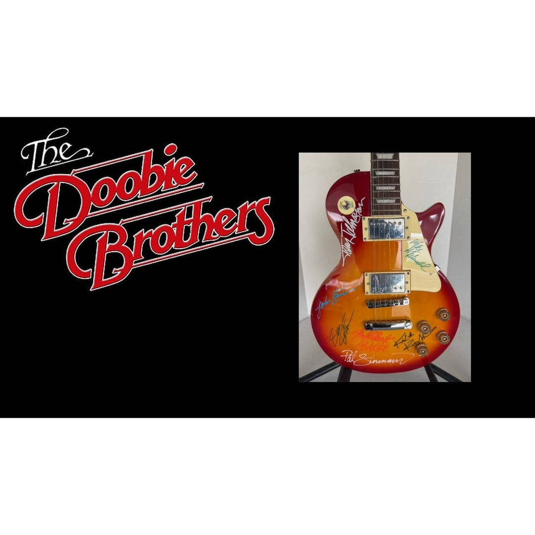 The Doobie Brothers Michael McDonald, Patrick Simmons, John McFee, Tom Johnston vintage Cherry Les Paul electric guitar signed with proof.