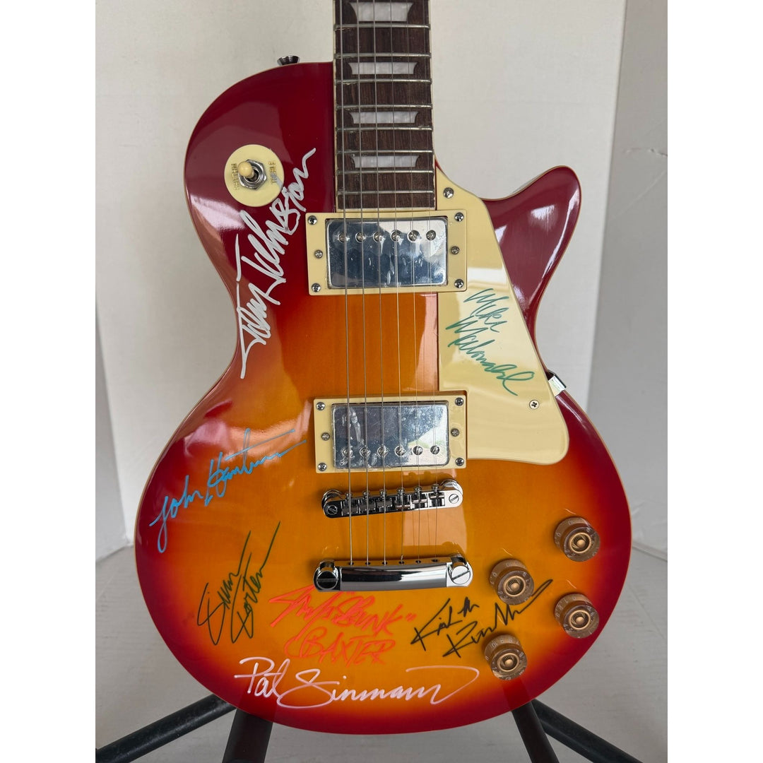 The Doobie Brothers Michael McDonald, Patrick Simmons, John McFee, Tom Johnston vintage Cherry Les Paul electric guitar signed with proof.