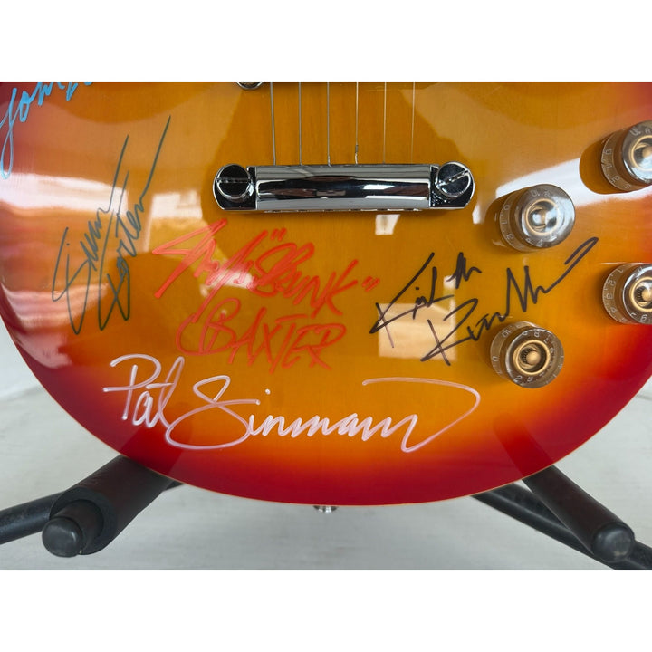 The Doobie Brothers Michael McDonald, Patrick Simmons, John McFee, Tom Johnston vintage Cherry Les Paul electric guitar signed with proof.