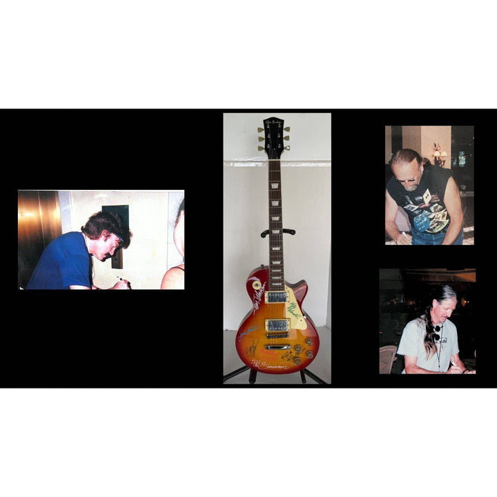 The Doobie Brothers Michael McDonald, Patrick Simmons, John McFee, Tom Johnston vintage Cherry Les Paul electric guitar signed with proof.