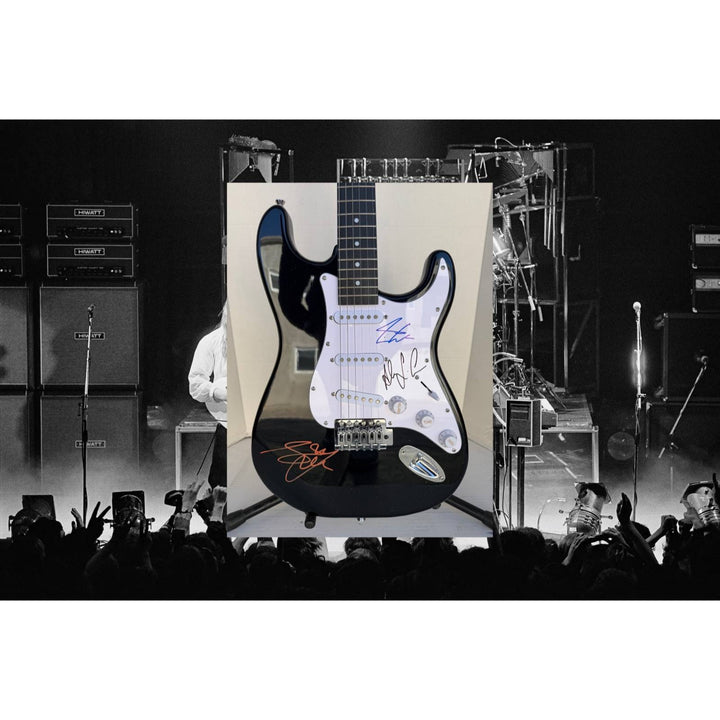 Geddy Lee Alex Lifeson Neil Peart Rush Stratocaster electric guitar signed with proof.