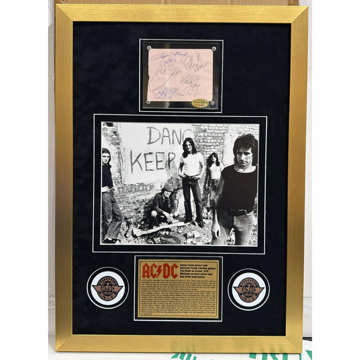 ACDC vintage autograph book page signed by original members Bon Scott Angus and Malcolm Young,  Phil Rudd & Cliff Williams