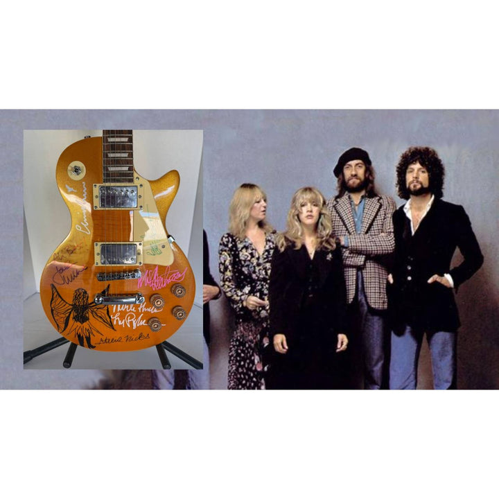 Fleetwood Mac vintage Gold les paul signed by Peter Green, Mick Fleetwood, Christine McVie, John McVie, Stevie Nicks  Lindsey Buckingham
