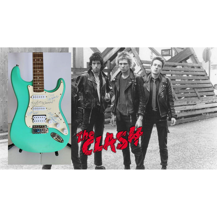 The Clash Mick Jones, Joe Strummer, Topper Headon, & Paul Simonon Fender Stratocaster electric guitar signed with proof