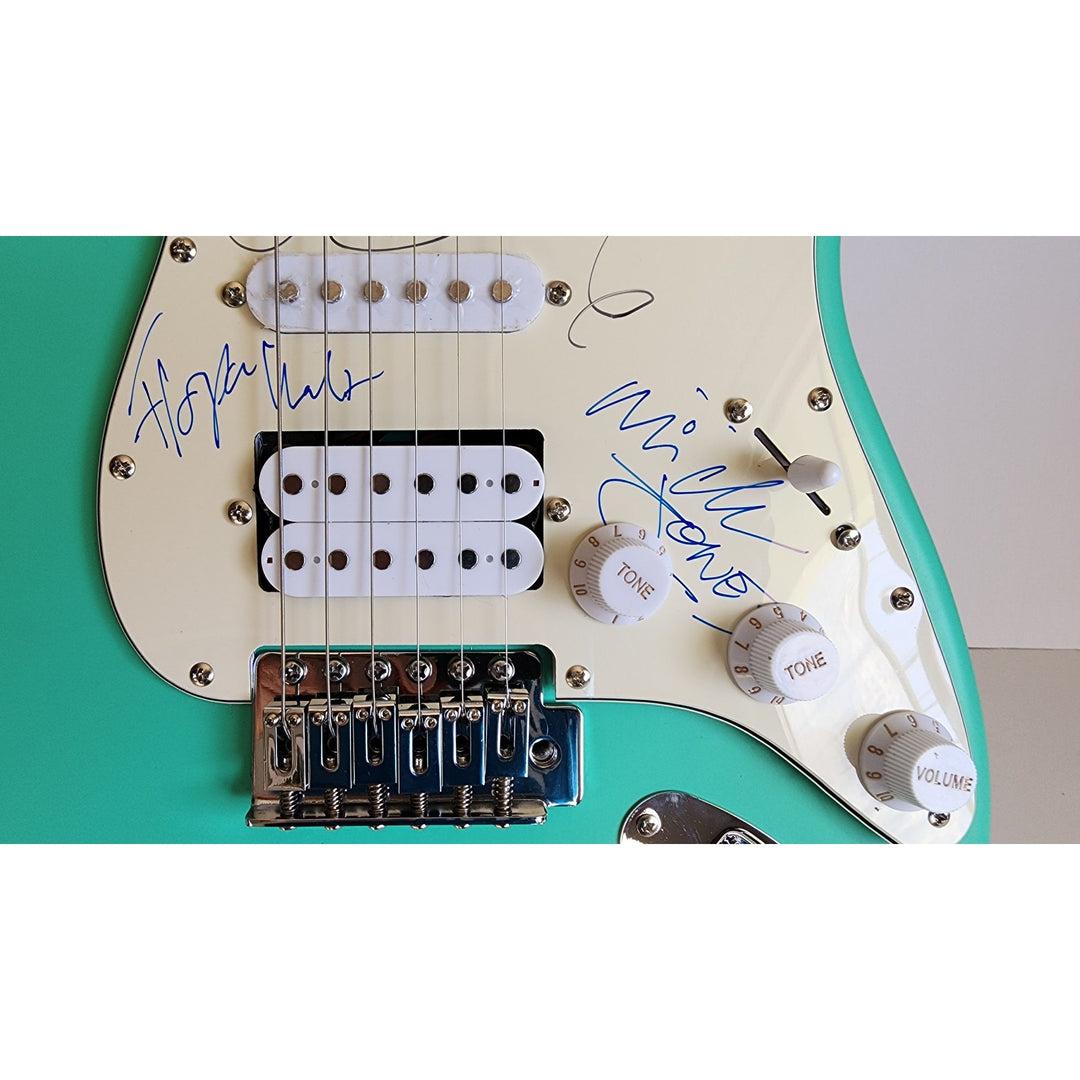 The Clash Mick Jones, Joe Strummer, Topper Headon, & Paul Simonon Fender Stratocaster electric guitar signed with proof