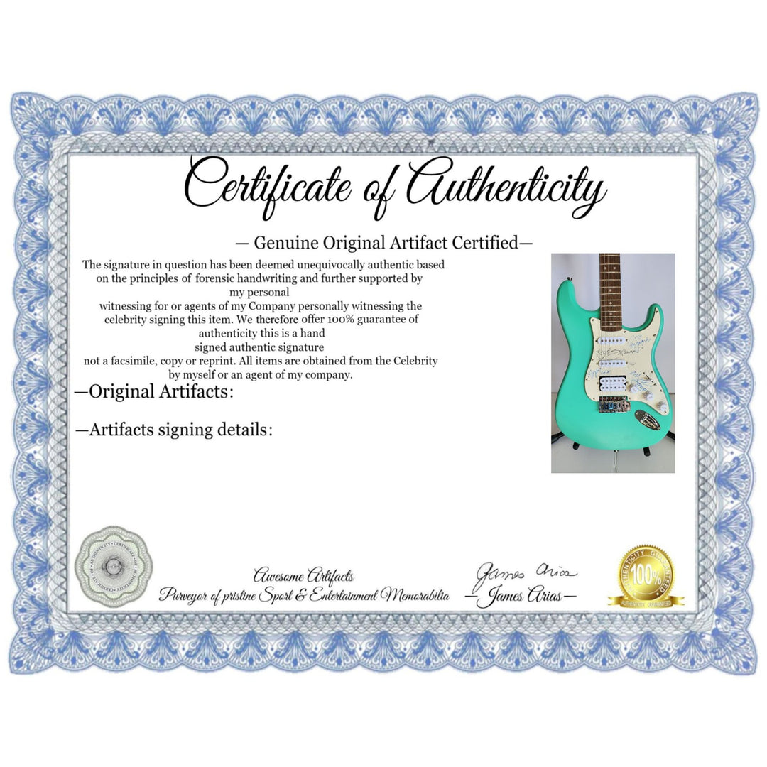 The Clash Mick Jones, Joe Strummer, Topper Headon, & Paul Simonon Fender Stratocaster electric guitar signed with proof