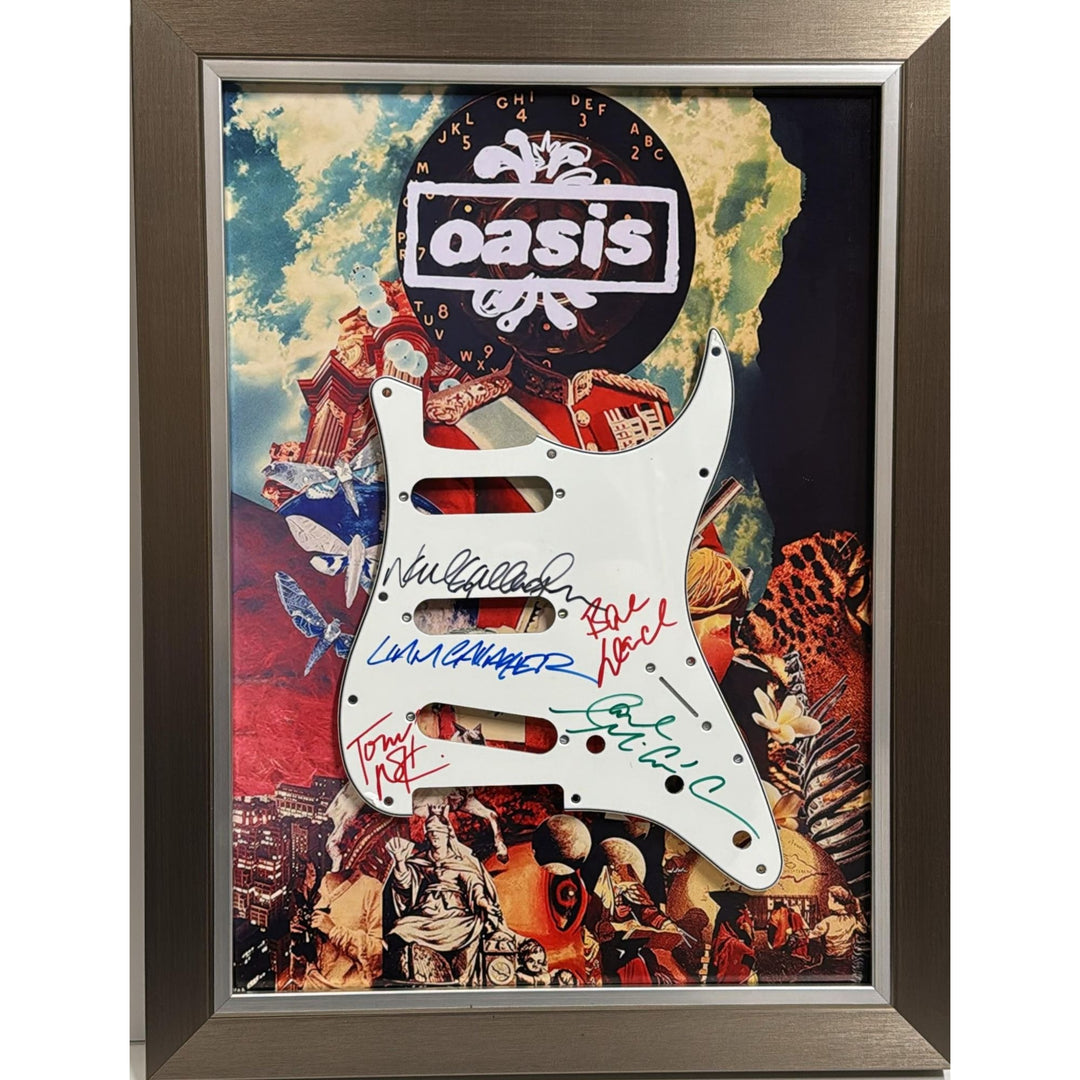 Oasis Alan White, Andy Bell, Gem Archer, Liam Gallagher, Noal Gallagher Fender Stratocaster pickguard signed and framed with proof