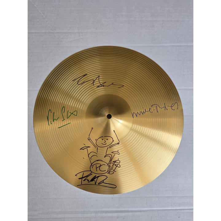 Genesis, Phil Collins, Tony Banks, Peter Gabriel, Mike Rutherford 16 inch cymbal signed with proof.