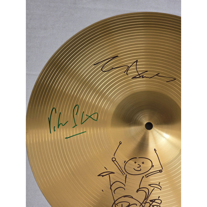 Genesis, Phil Collins, Tony Banks, Peter Gabriel, Mike Rutherford 16 inch cymbal signed with proof.