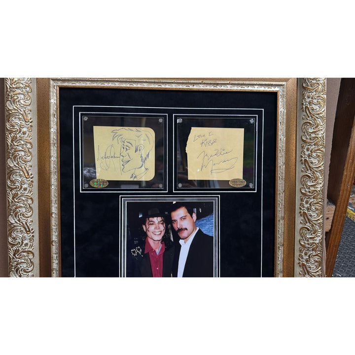Michael Jackson "The King of Pop".and Queen lead singer Freddie Mercury signed with proof and museum quality framed 24x36.