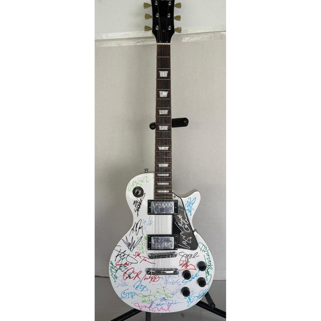 Grunge legends  Pearl Jam STP Smashing Pumpkins Soundgarden Nirvana Alice in Chains Mudhoney & Hole white Les Paul electric guitar signed..