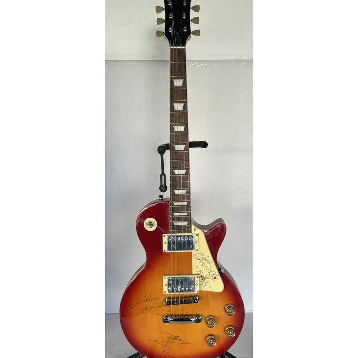 The Who Roger Daltry, Pete Townshend, John Entwhistle full size Cherry les paul guitar signed with proof.