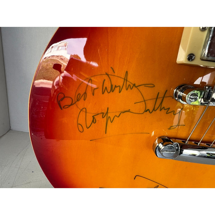 The Who Roger Daltry, Pete Townshend, John Entwhistle full size Cherry les paul guitar signed with proof.