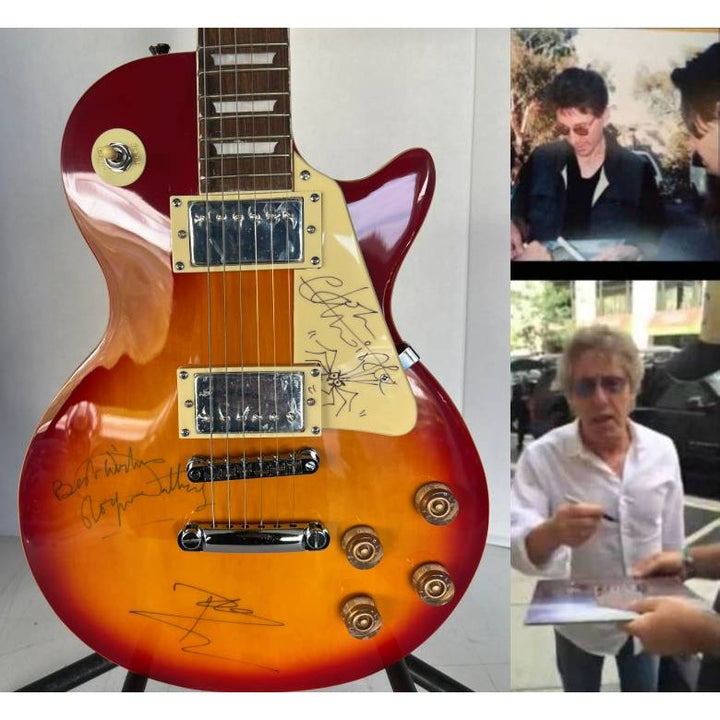 The Who Roger Daltry, Pete Townshend, John Entwhistle full size Cherry les paul guitar signed with proof.