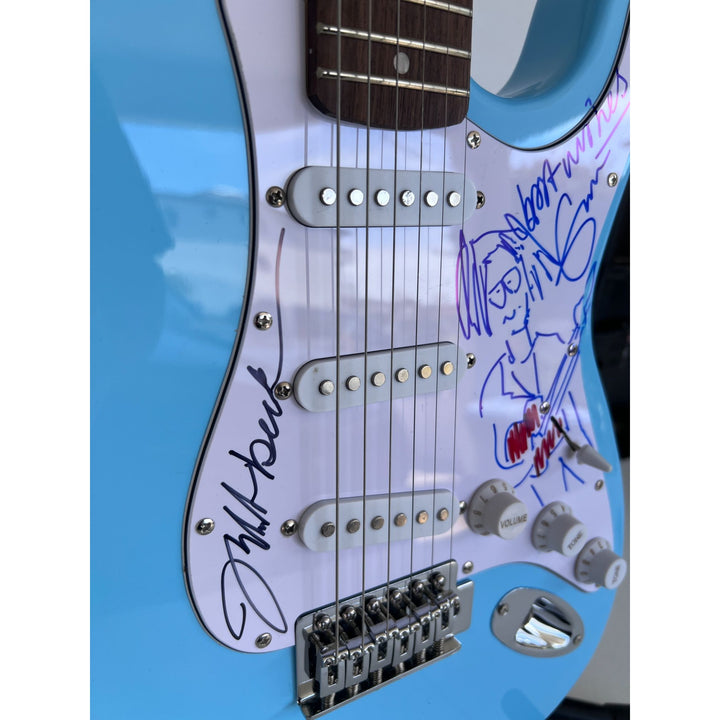 Eric Clapton & Jeff Beck electric guitar signed with proof.