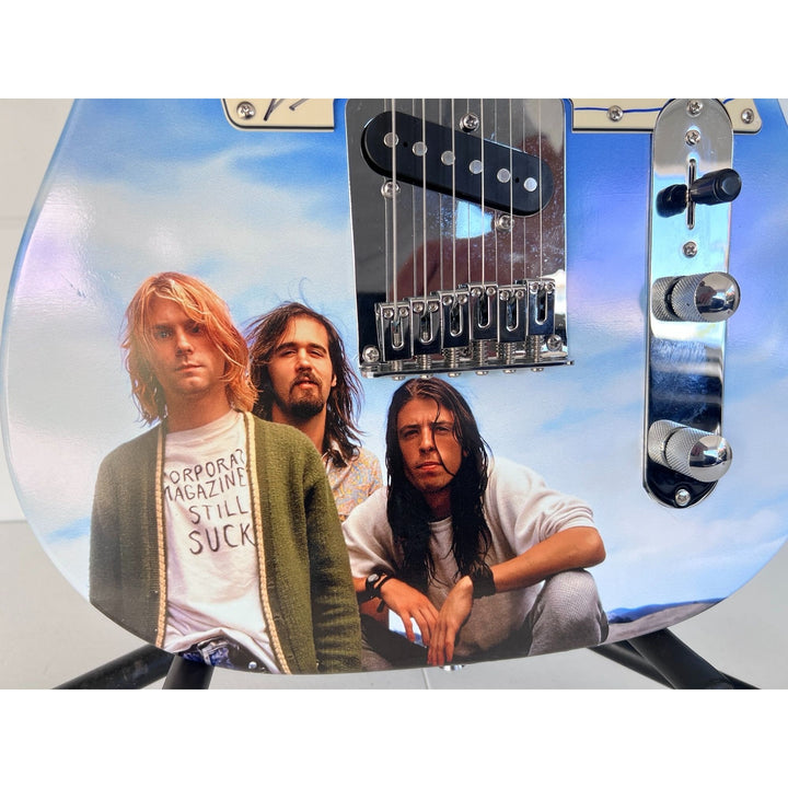 Nirvana Kurt Cobain (with sketch) Krist Novoselic David Grohl (with sketch) One of a Kind full size telecaster electric guitar signed.