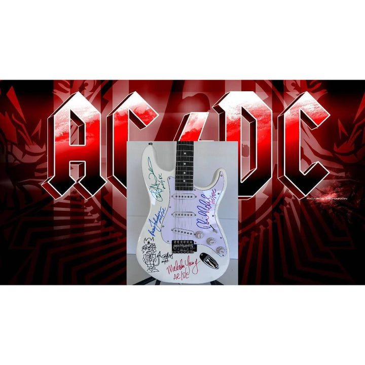 AC-DC Angus Young & Malcolm Young Brian Johnston Cliff Williams Phil Rudd electric guitar signed with proof.