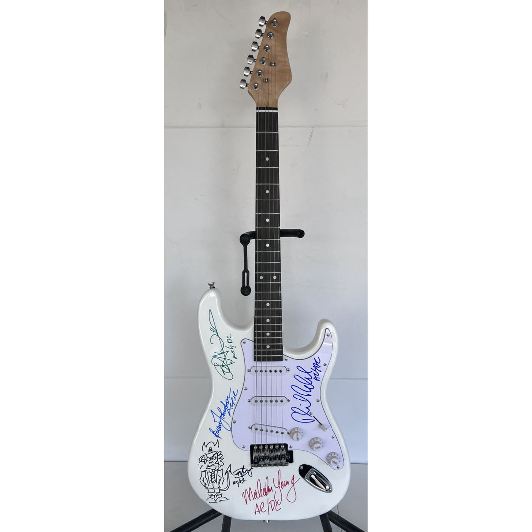 AC-DC Angus Young & Malcolm Young Brian Johnston Cliff Williams Phil Rudd electric guitar signed with proof.