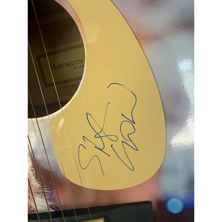 Sheryl Crow one of a kind acoustic guitar signed with proof.