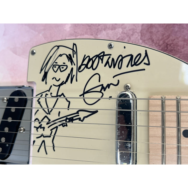 Eric Clapton and Stevie Ray Vaughan with hand made sketch and inscription from (Stevie)  one of a kind full size electric guitar signed.