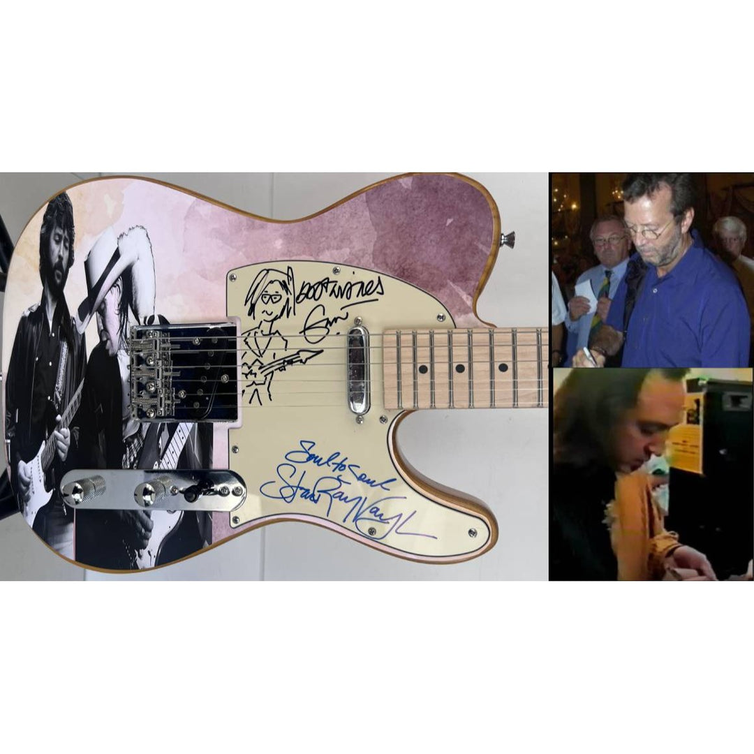 Eric Clapton and Stevie Ray Vaughan with hand made sketch and inscription from (Stevie)  one of a kind full size electric guitar signed.
