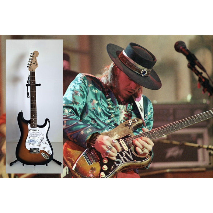 Vaughan Johnny, Stevie Ray, Winter Jeff Beck, Fender Stratocaster electric guitar signed with proof