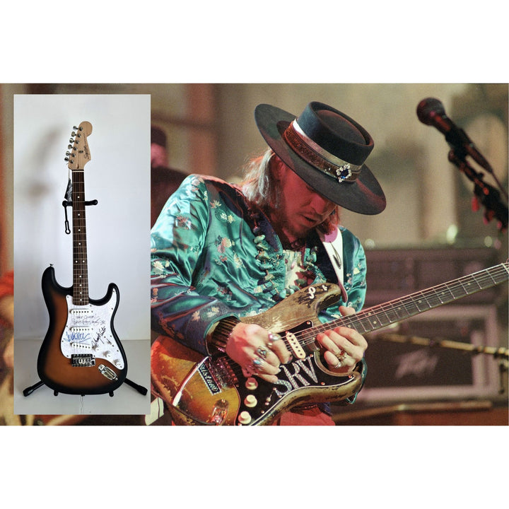 Vaughan Johnny, Stevie Ray, Winter Jeff Beck, Fender Stratocaster electric guitar signed with proof