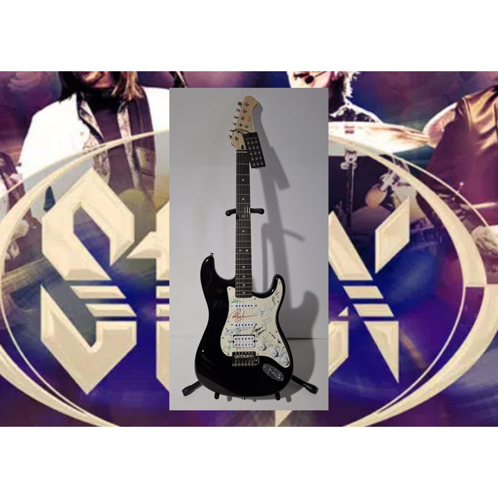 Styx: James Young, Tommy Shaw, Todd Sucherman, Lawrence Gowan, Will Evankovich, Terry Gowan Dennis D. Fender Stratocaster signed with proof