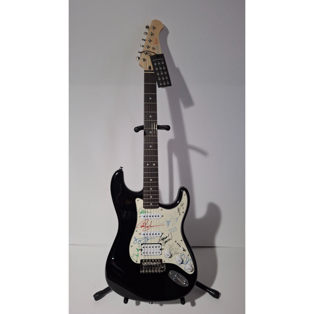 Styx: James Young, Tommy Shaw, Todd Sucherman, Lawrence Gowan, Will Evankovich, Terry Gowan Dennis D. Fender Stratocaster signed with proof