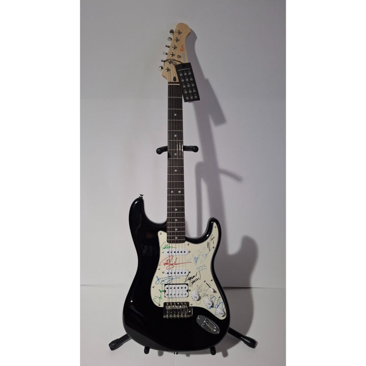 Styx: James Young, Tommy Shaw, Todd Sucherman, Lawrence Gowan, Will Evankovich, Terry Gowan Dennis D. Fender Stratocaster signed with proof