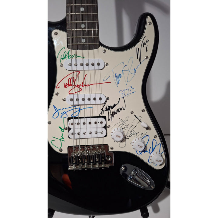 Styx: James Young, Tommy Shaw, Todd Sucherman, Lawrence Gowan, Will Evankovich, Terry Gowan Dennis D. Fender Stratocaster signed with proof