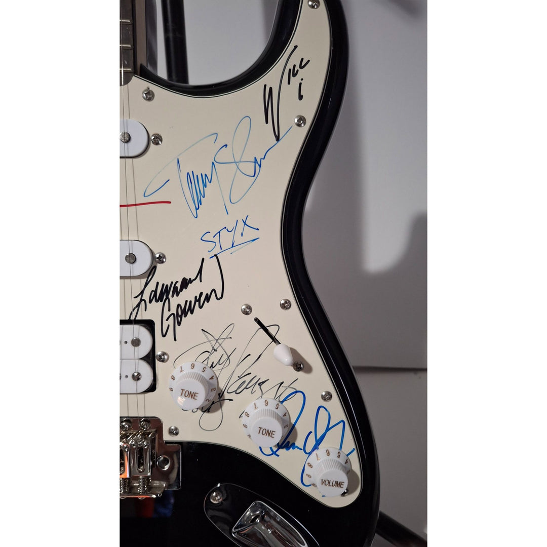 Styx: James Young, Tommy Shaw, Todd Sucherman, Lawrence Gowan, Will Evankovich, Terry Gowan Dennis D. Fender Stratocaster signed with proof