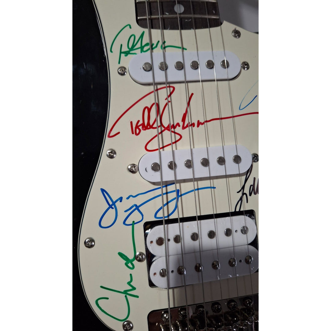 Styx: James Young, Tommy Shaw, Todd Sucherman, Lawrence Gowan, Will Evankovich, Terry Gowan Dennis D. Fender Stratocaster signed with proof