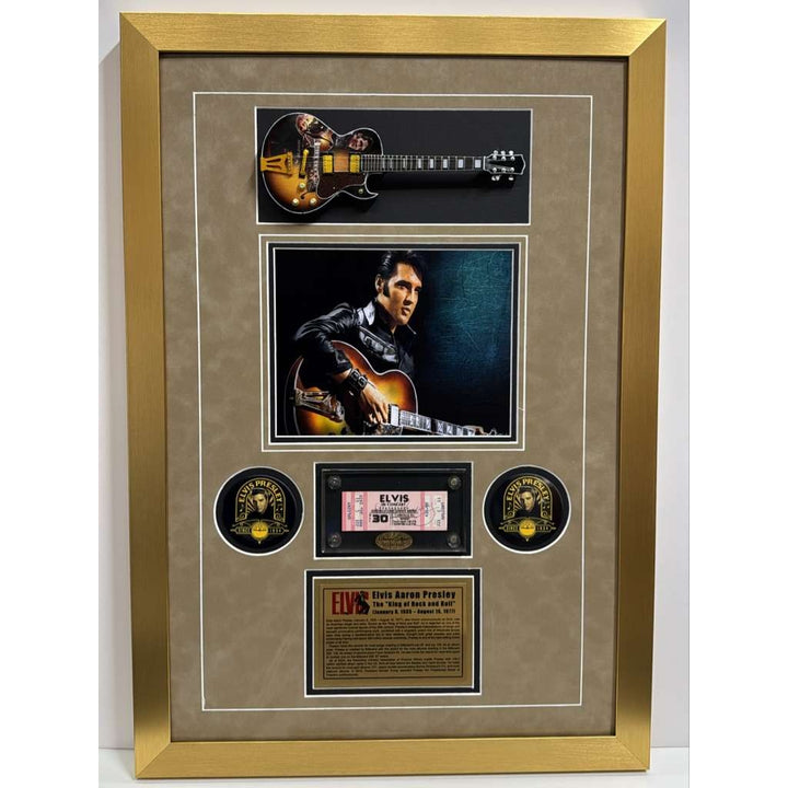 Elvis Presley original concert ticket signed with proof, his model guitar in miniature scale, with a museum quality frame 21.25x 30.5
