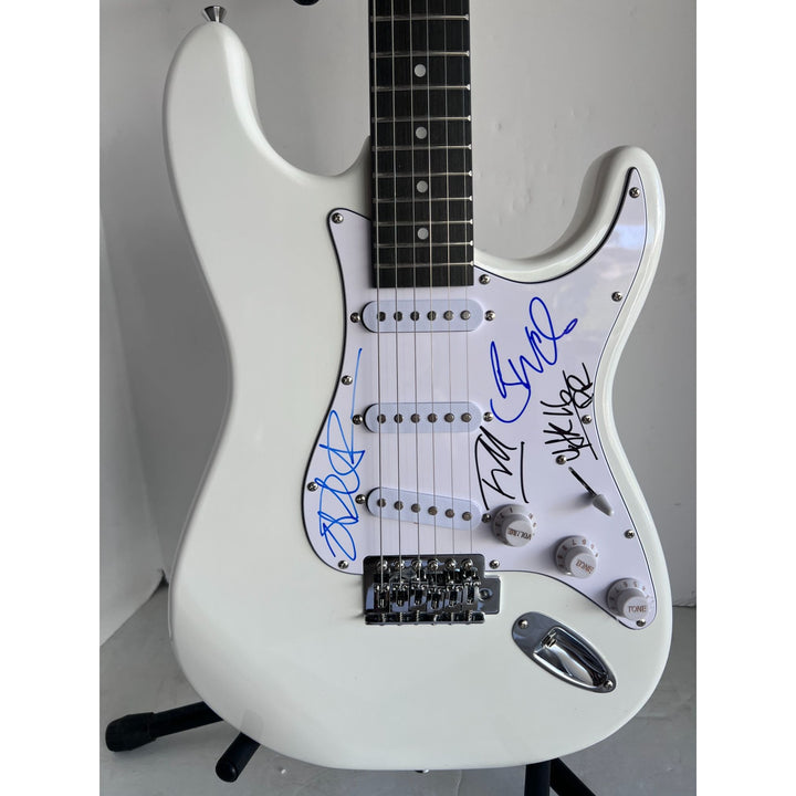 Rage Against the Machine electric guitar signed by Zack de la Rocha Tom Morello Tim Commerford Brad Wilk with proof