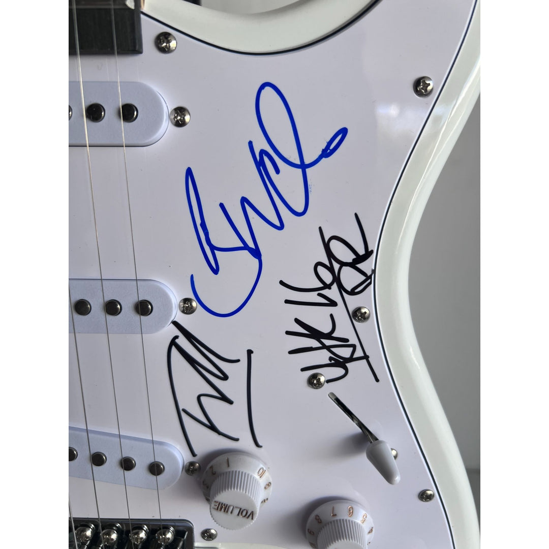 Rage Against the Machine electric guitar signed by Zack de la Rocha Tom Morello Tim Commerford Brad Wilk with proof