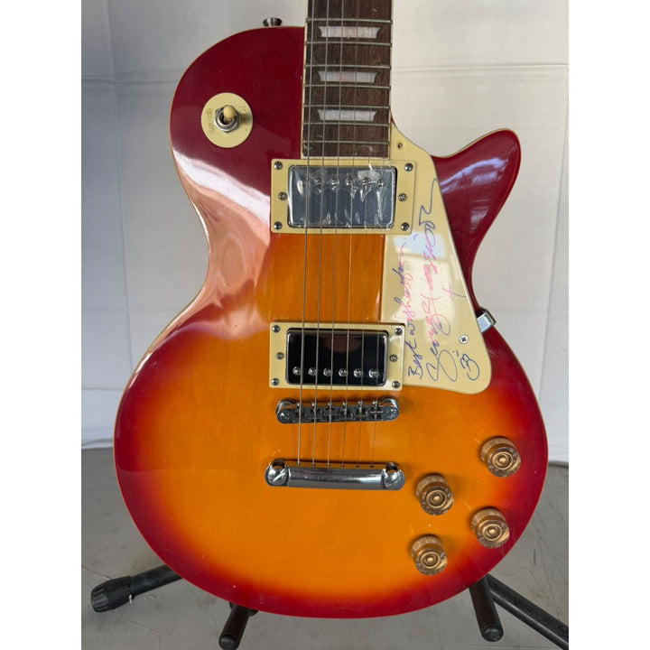 George Harrison of Beatles and Traveling Wilburys Les Paul vintage electric guitar signed with full provenance,  proof and AI certification..