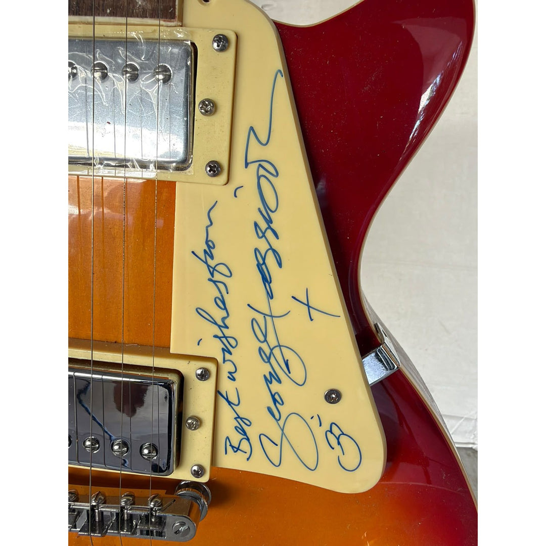 George Harrison of Beatles and Traveling Wilburys Les Paul vintage electric guitar signed with full provenance,  proof and AI certification..