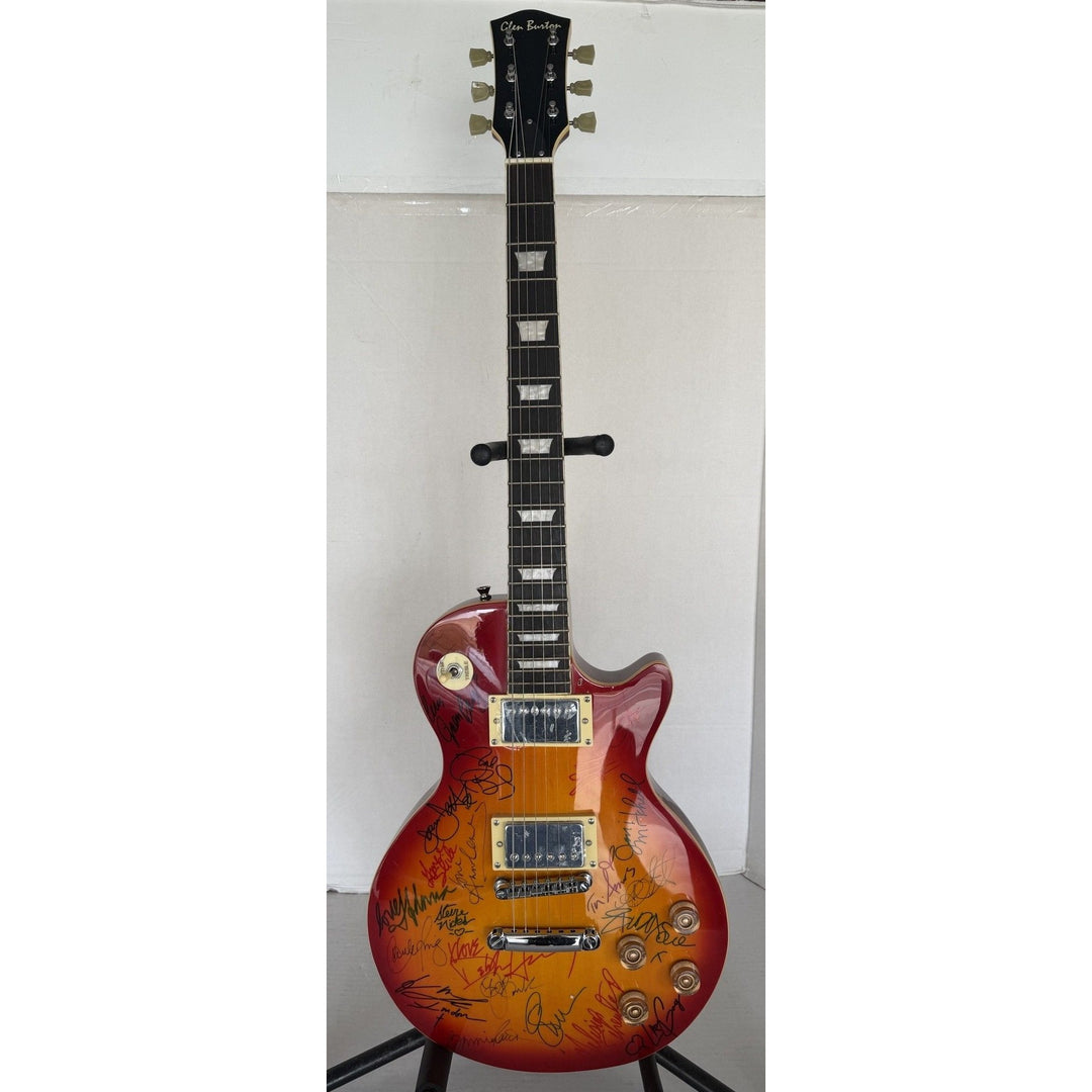 Madonna Tina Turner Stevie Nicks 20 plus women of rock full size Cherry Les Paul electric guitar signed with proof.