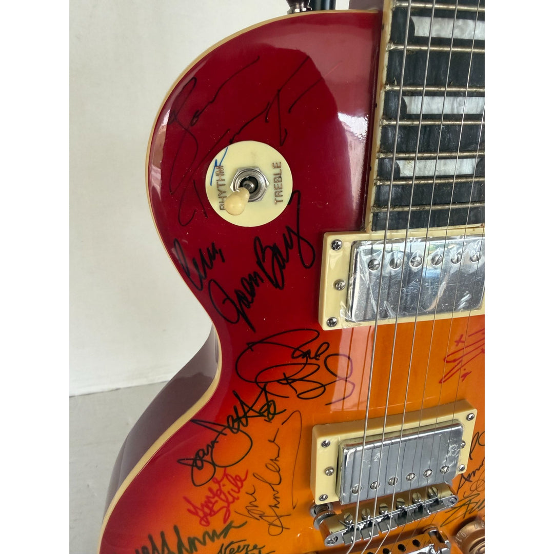 Madonna Tina Turner Stevie Nicks 20 plus women of rock full size Cherry Les Paul electric guitar signed with proof.