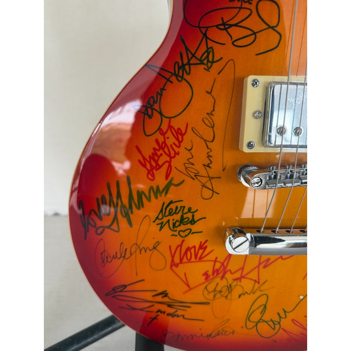 Madonna Tina Turner Stevie Nicks 20 plus women of rock full size Cherry Les Paul electric guitar signed with proof.