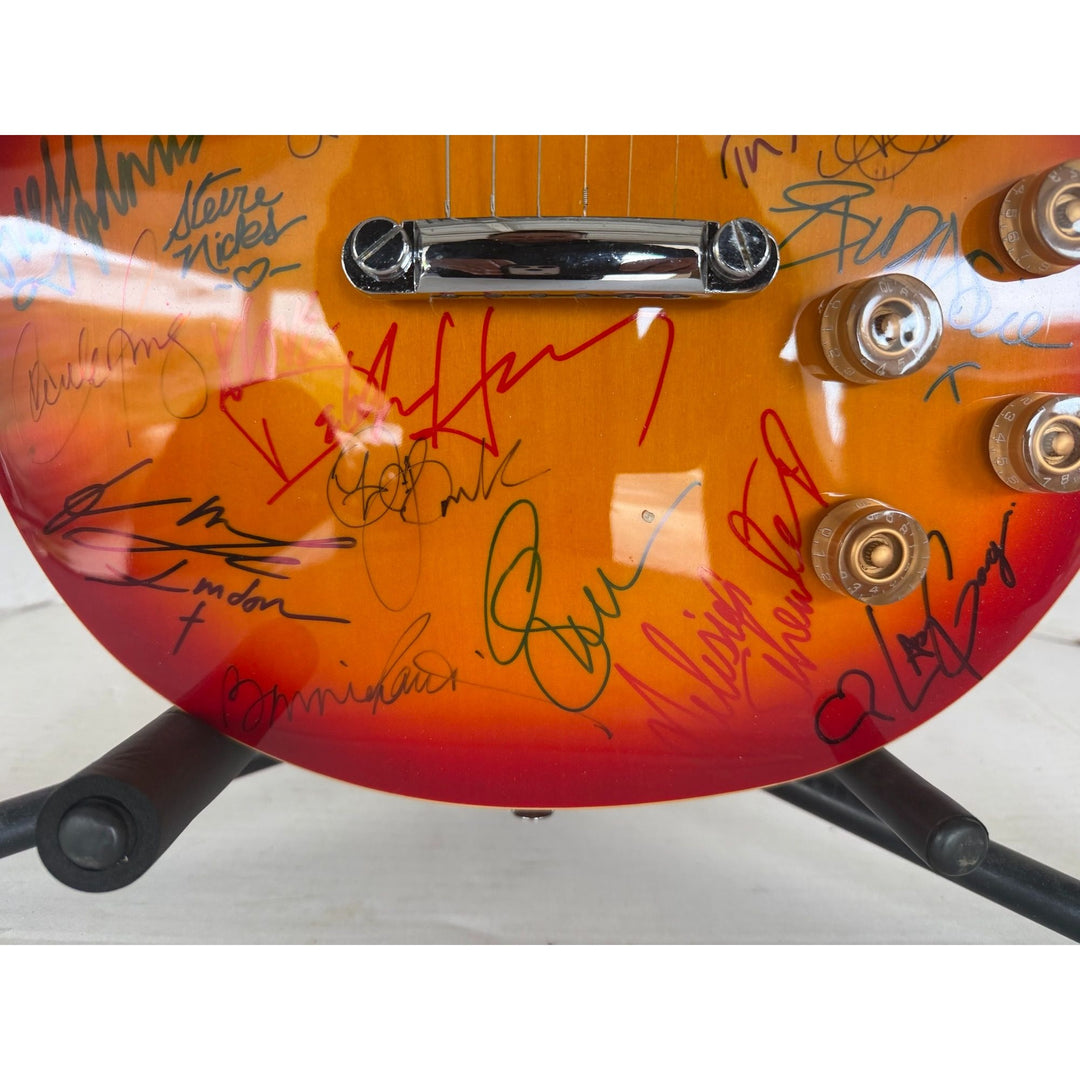 Madonna Tina Turner Stevie Nicks 20 plus women of rock full size Cherry Les Paul electric guitar signed with proof.