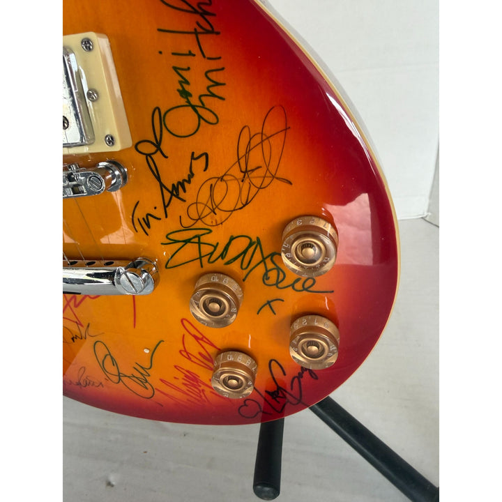 Madonna Tina Turner Stevie Nicks 20 plus women of rock full size Cherry Les Paul electric guitar signed with proof.