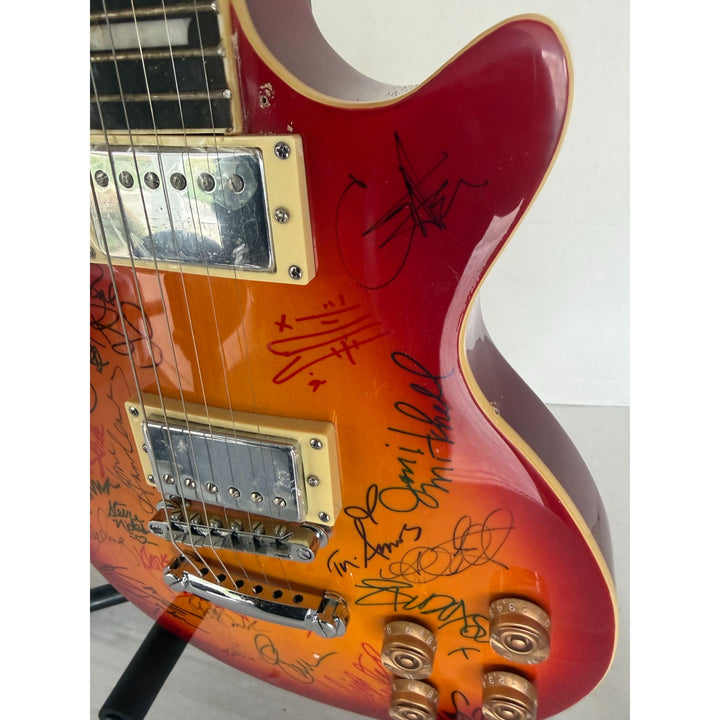 Madonna Tina Turner Stevie Nicks 20 plus women of rock full size Cherry Les Paul electric guitar signed with proof.
