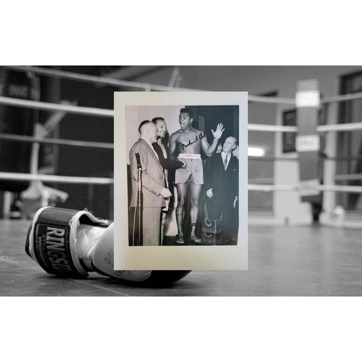 Muhammad Ali 8 x 10 photo signed with proof - Awesome Artifacts 