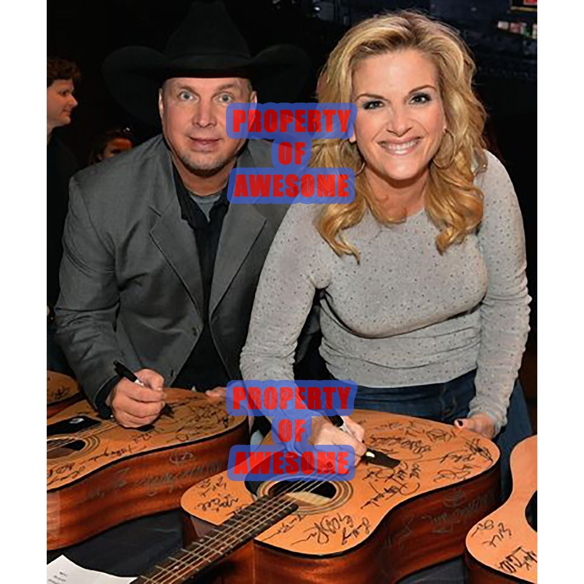 Garth Brooks and Trisha Yearwood 8 by 10 signed photo with proof