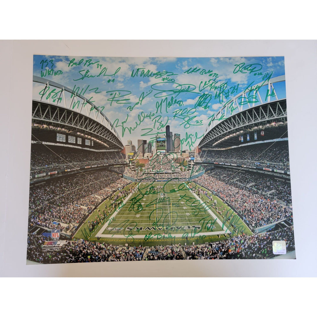 Seattle Seahawks Russell Wilson Marshawn Lynch Pete Carroll team signed 16 x 20 photo 2014 Super Bowl champs - Awesome Artifacts 