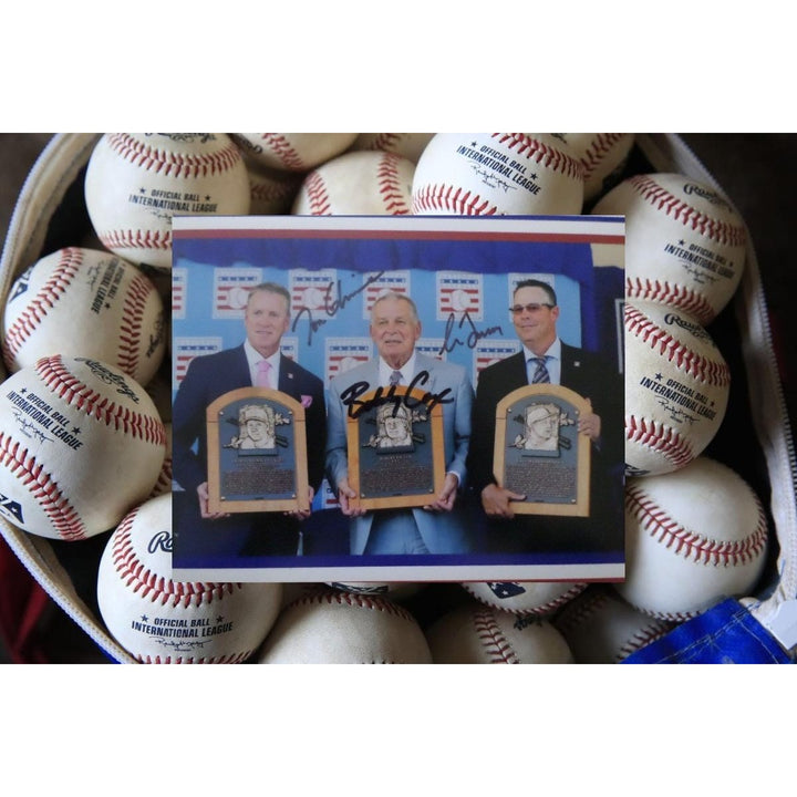 Greg Maddux Tom glavine and Bobby Cox 8 x 10 signed photo